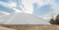 The new football arena in the form of a huge dome is an air-bearing structure measuring 115 Ãâ 82 meters with a field and stands Royalty Free Stock Photo